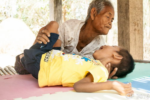 One of our gorgeous Kinship grandmothers working with her grandson who is part of our ABLE program.