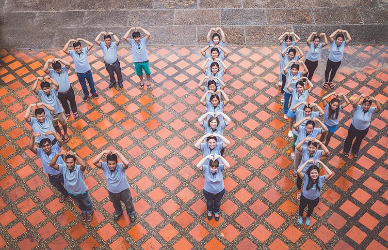 Children in Families team get together to make a photo of the letters CIF